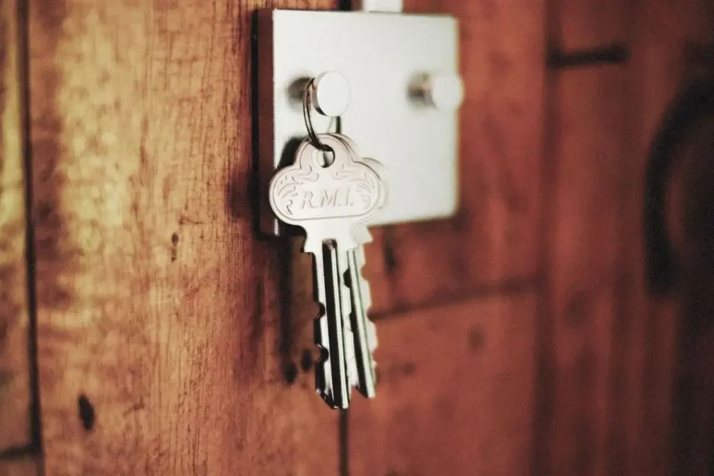Key in the lock of a timber door – testing a new door lock after you replace it, how to replace a door lock in Lancing with L.M.N Locksmiths Lancing