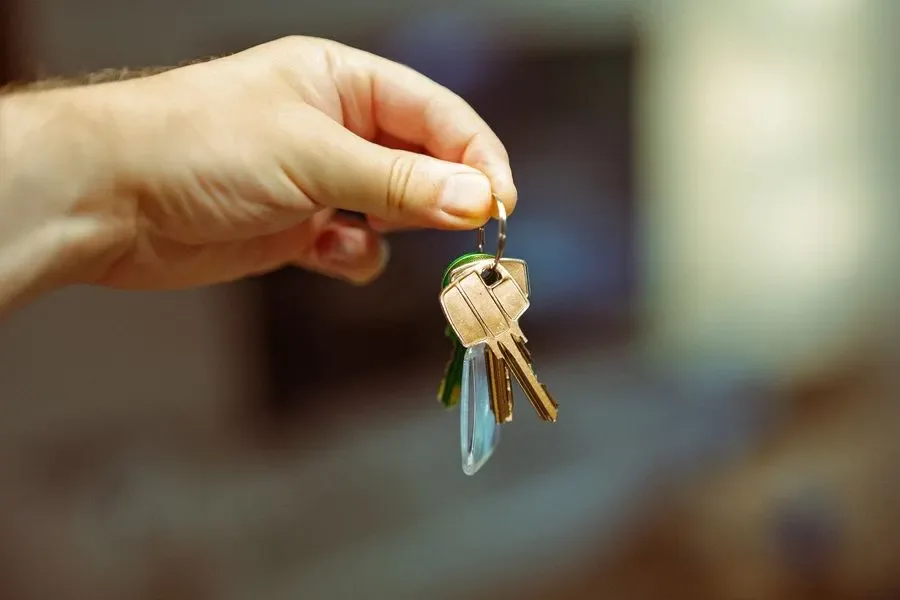 Hand holding a set of house keys – residential locksmith Lancing help for landlords and letting agents from Locksmith Lancing